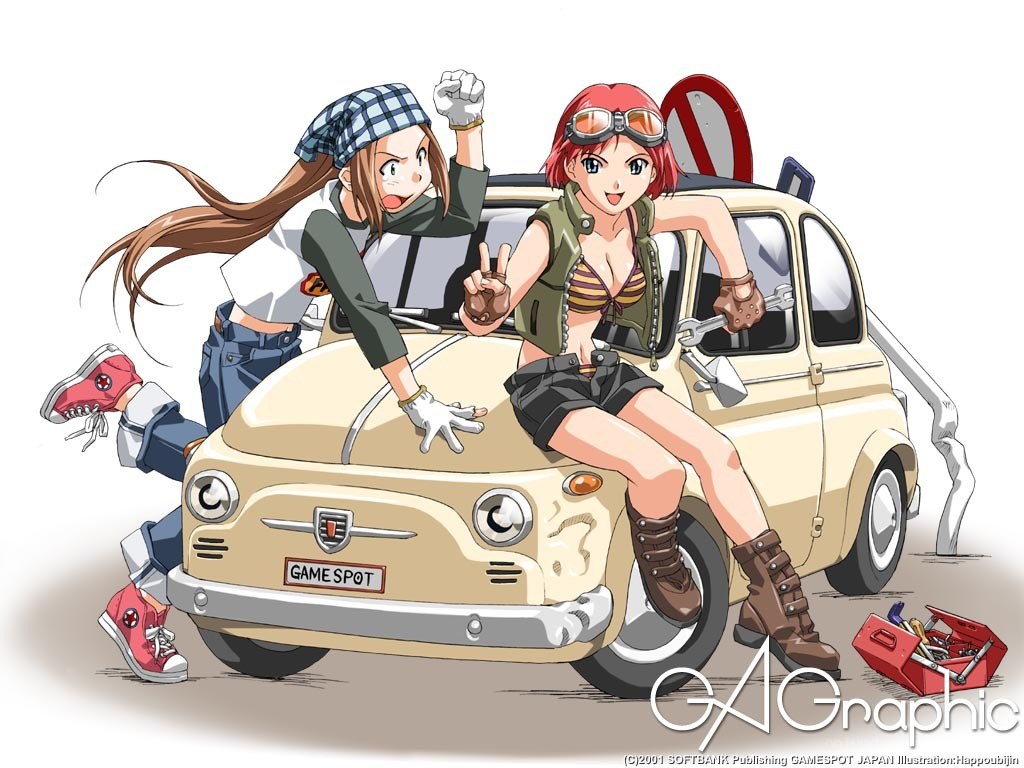 Two girls with a vintage car