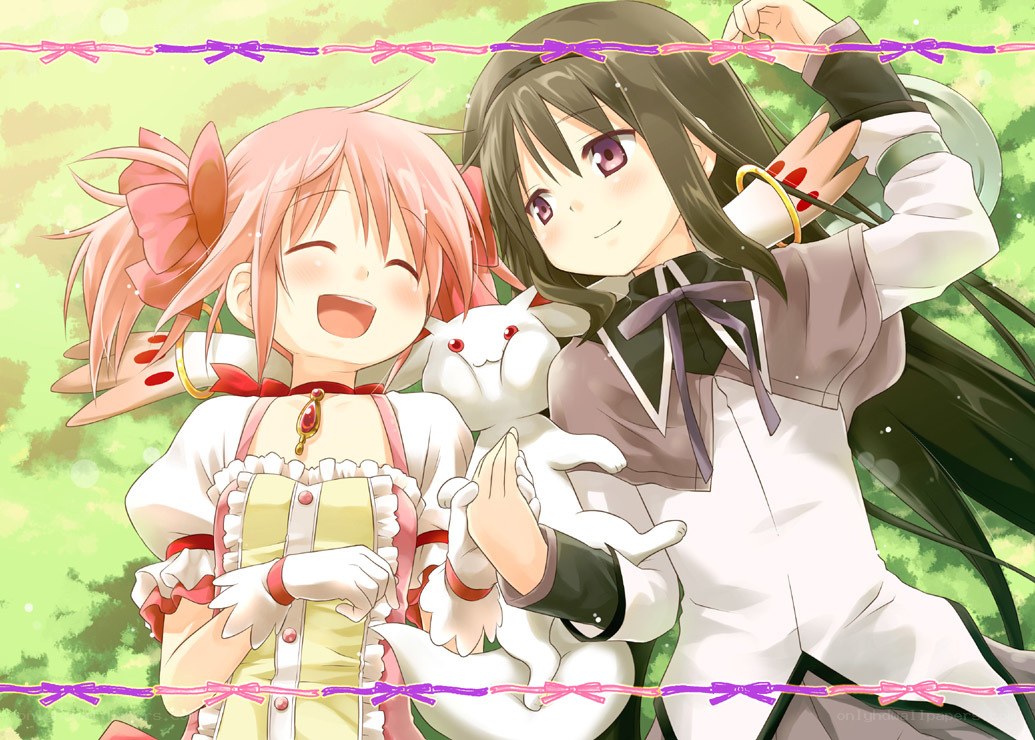 Two girls with a white rabbit
