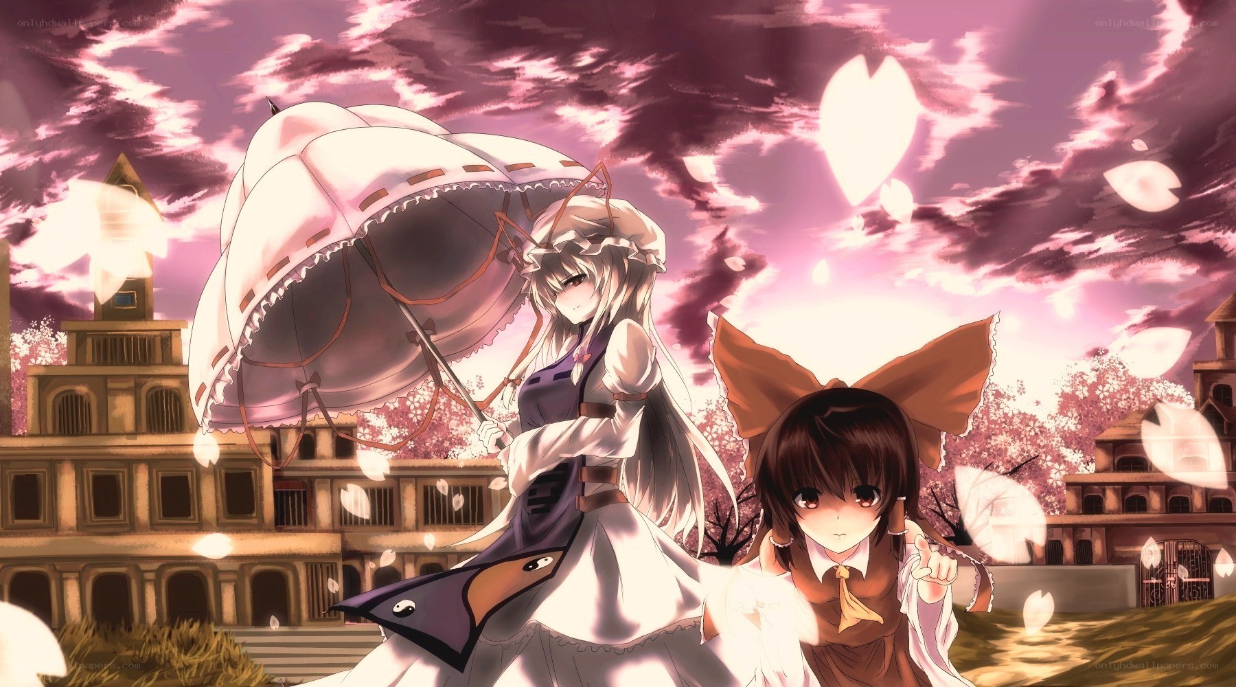 Two girls with an umbrella