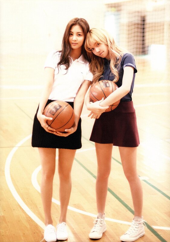Two girls with basketballs