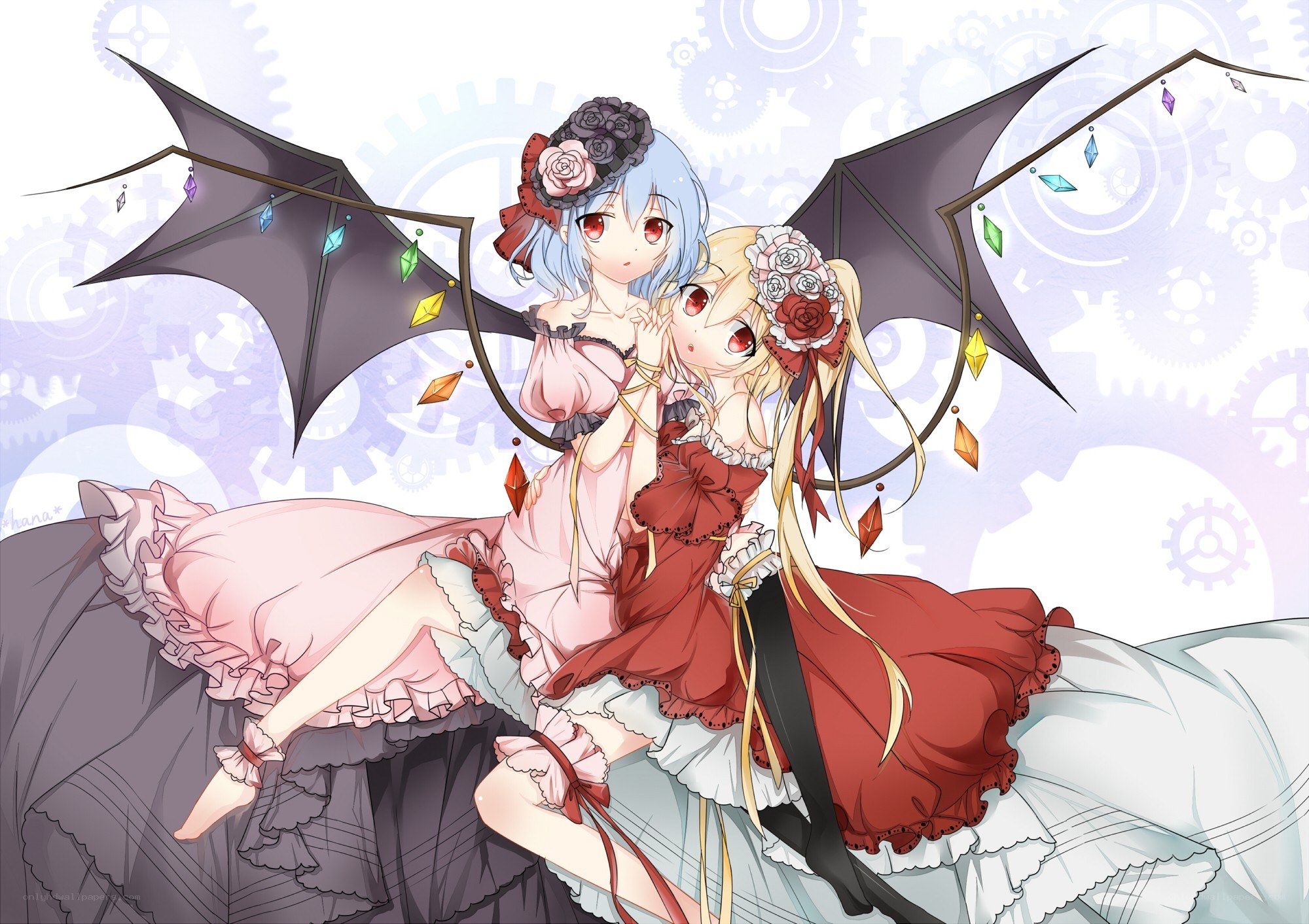 Two girls with bat wings