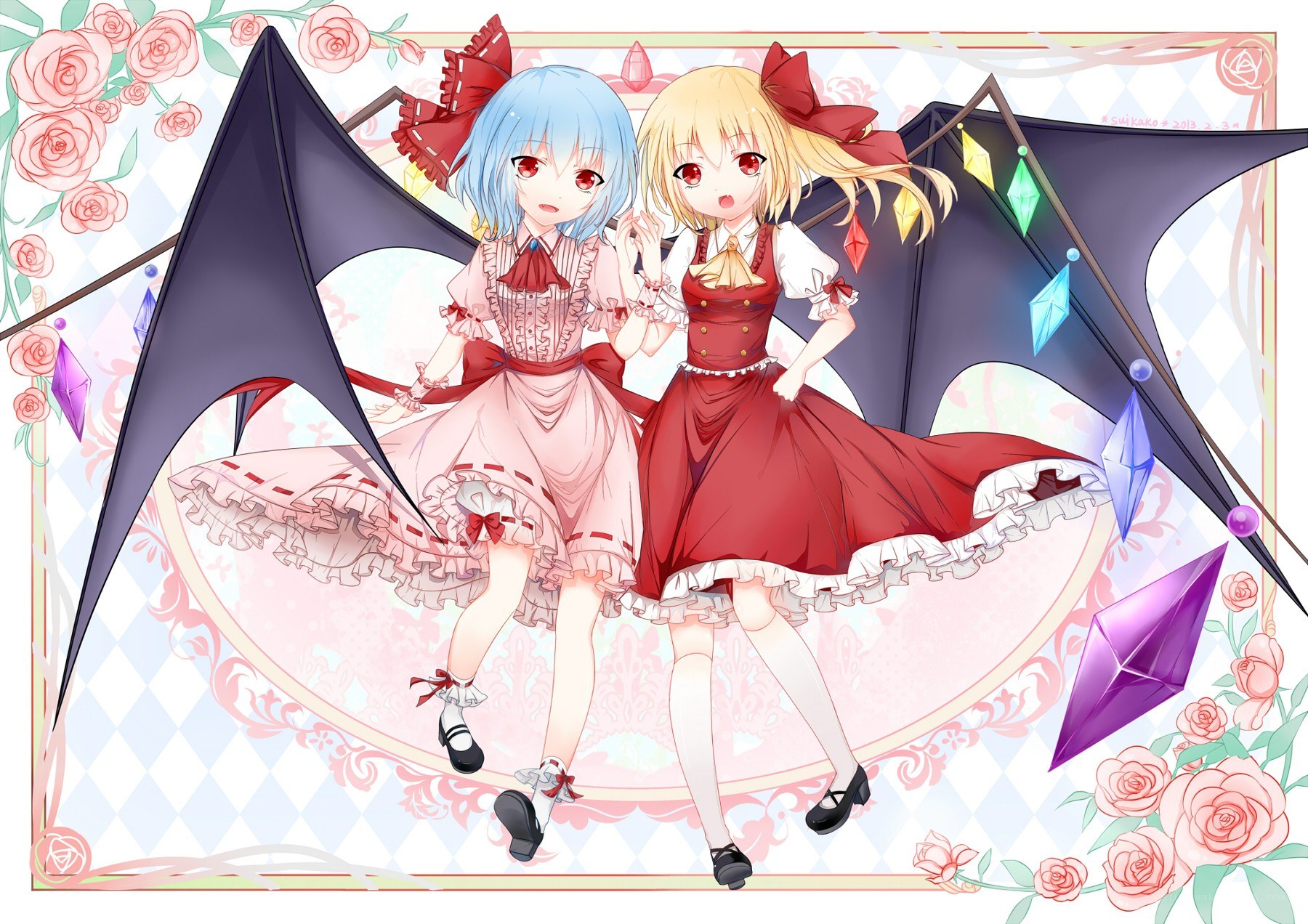 Two girls with bat wings