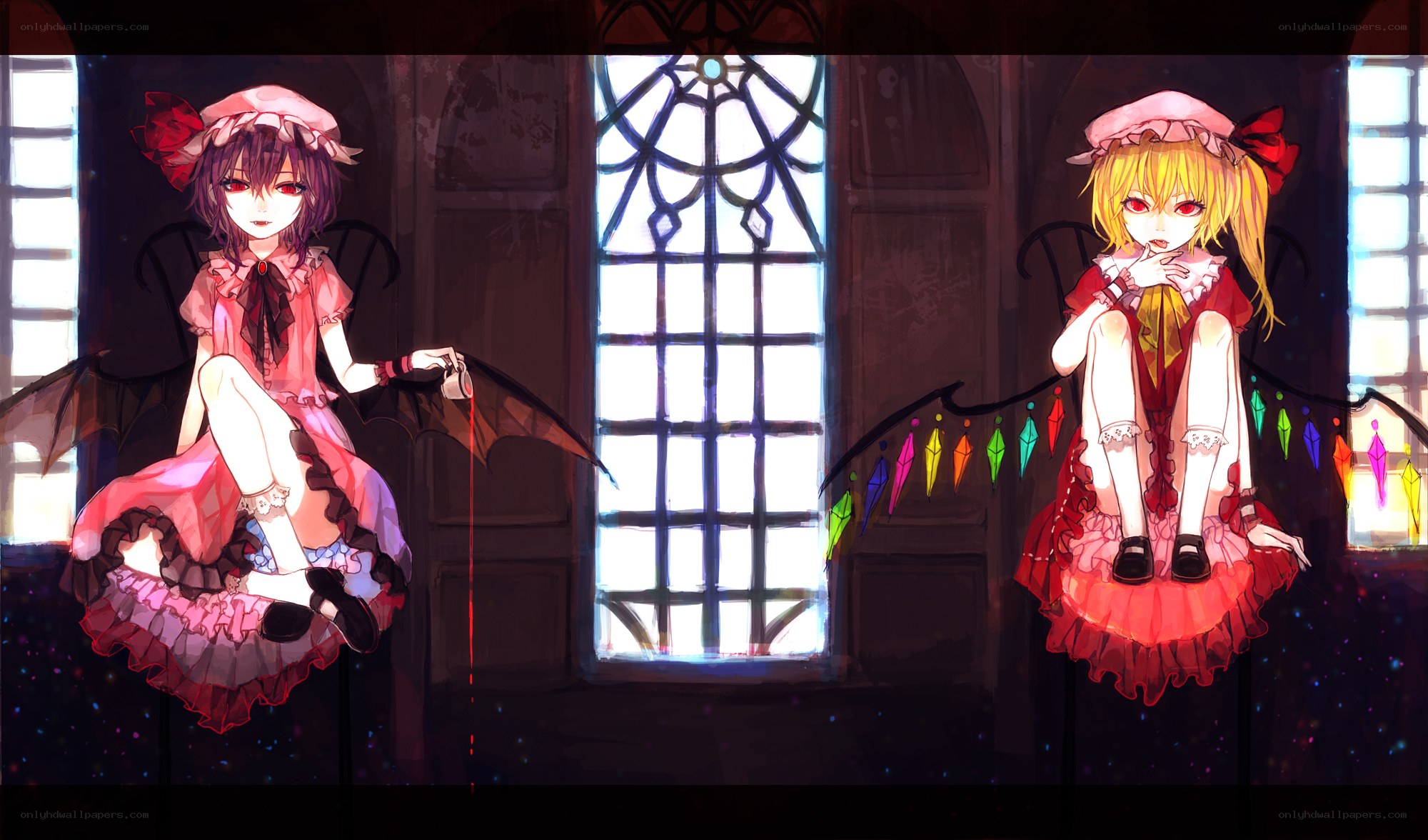 Two girls with bat wings