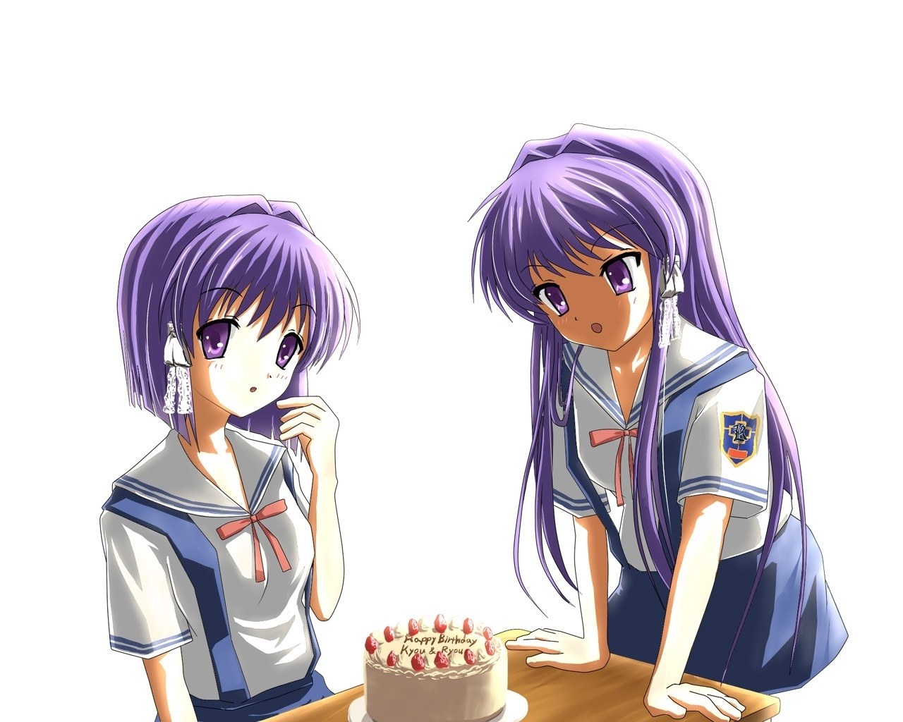 Two girls with birthday cake