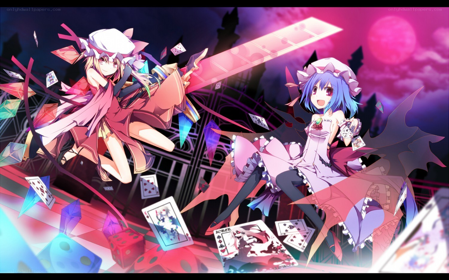 Two girls with cards and dice