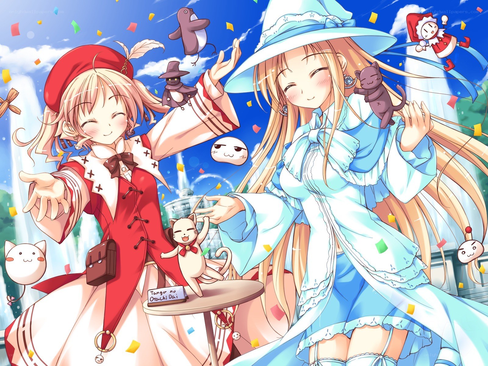 Two girls with cats and confetti