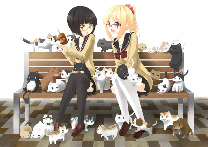 Two girls with cats on a bench