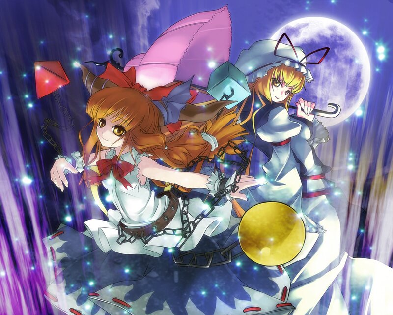Two girls with chains in moonlight