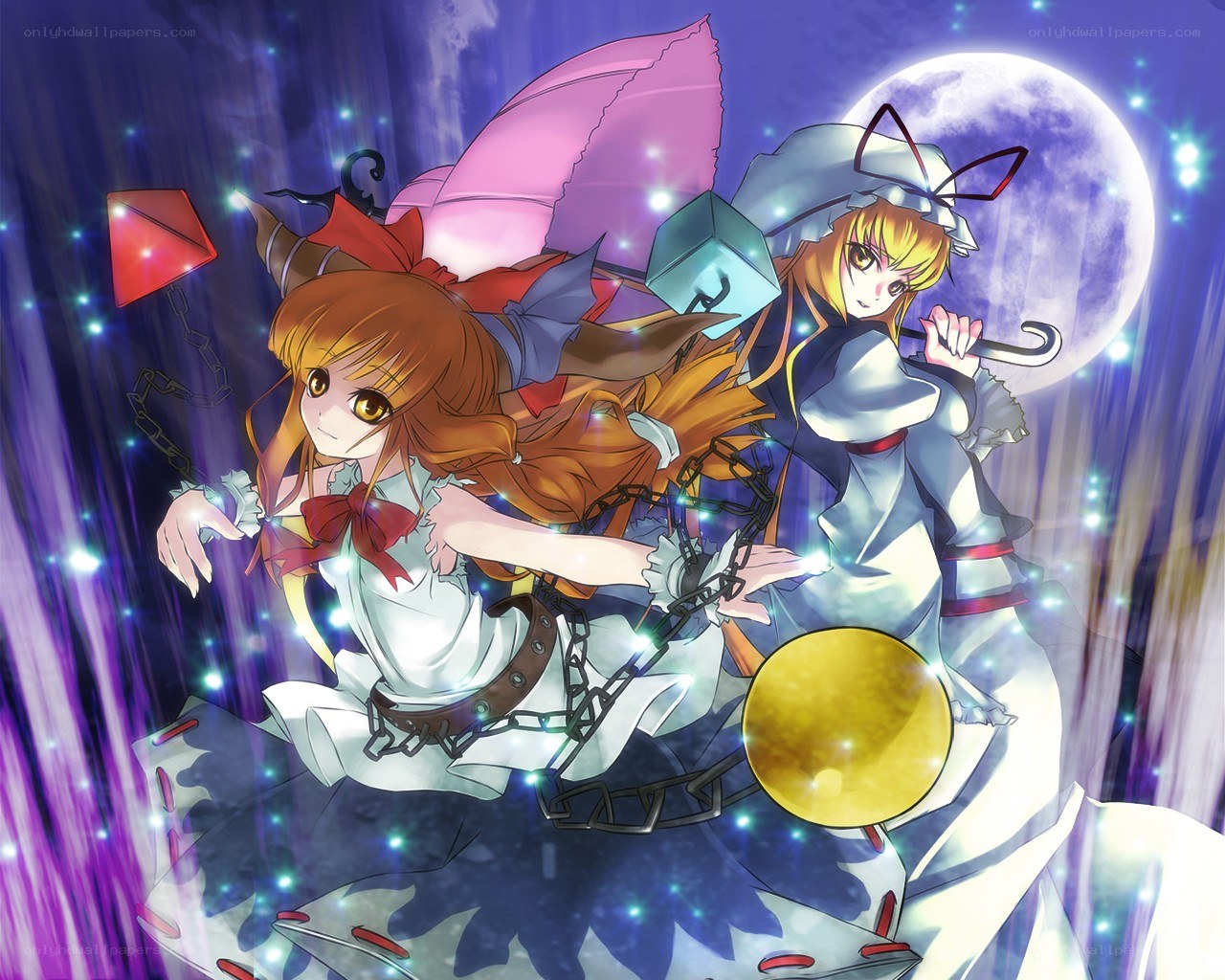 Two girls with chains in moonlight