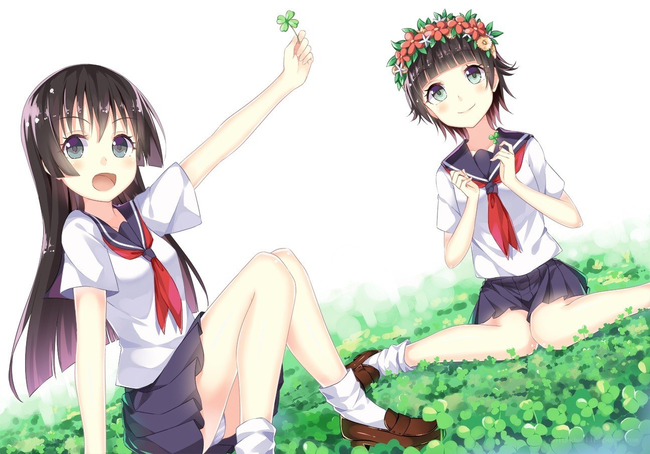 Two girls with clover