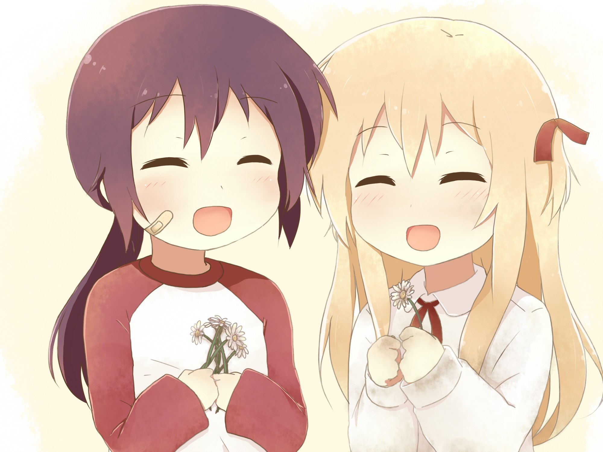 Two girls with daisies
