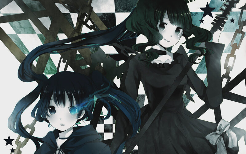 Two girls with dark hair and chains