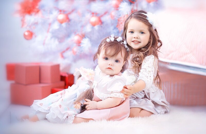 Two Girls with Doll
