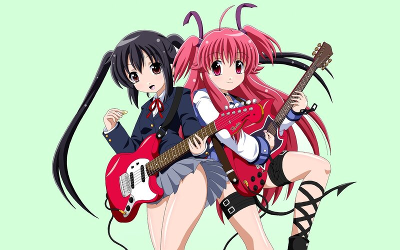 Two girls with electric guitars