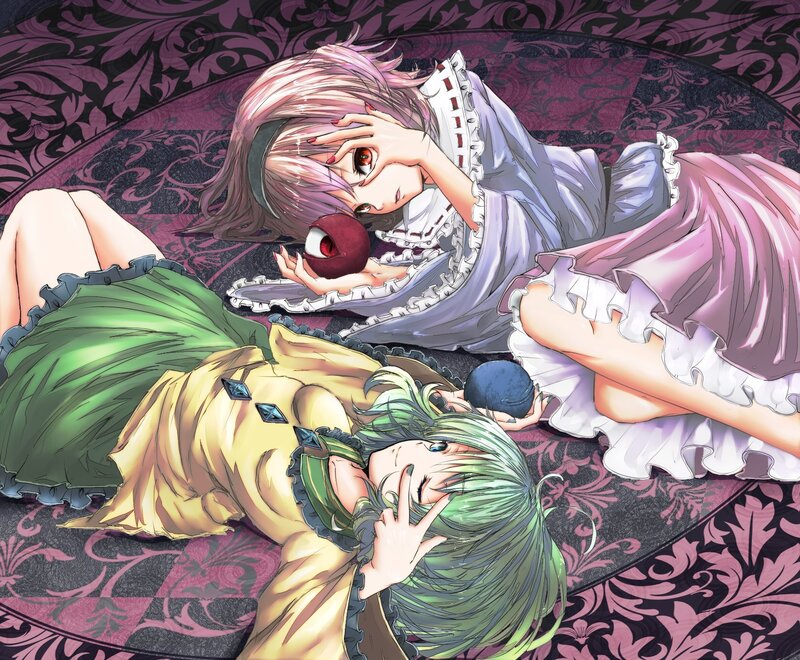 Two girls with eyes in their hands