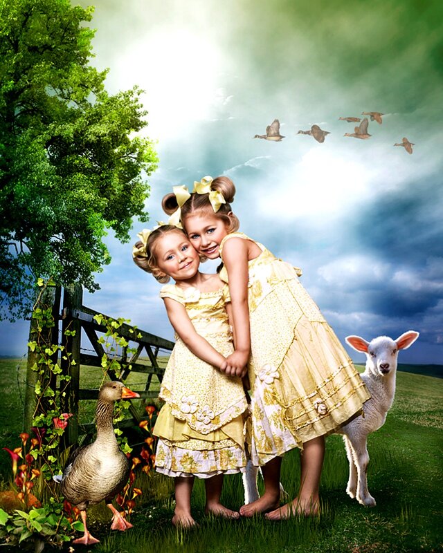 Two girls with farm animals