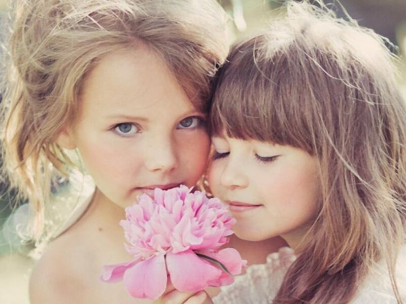 Two Girls with Flower