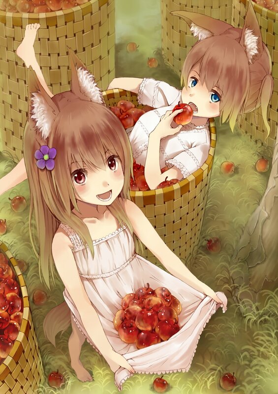 Two girls with fox ears in apple orchard