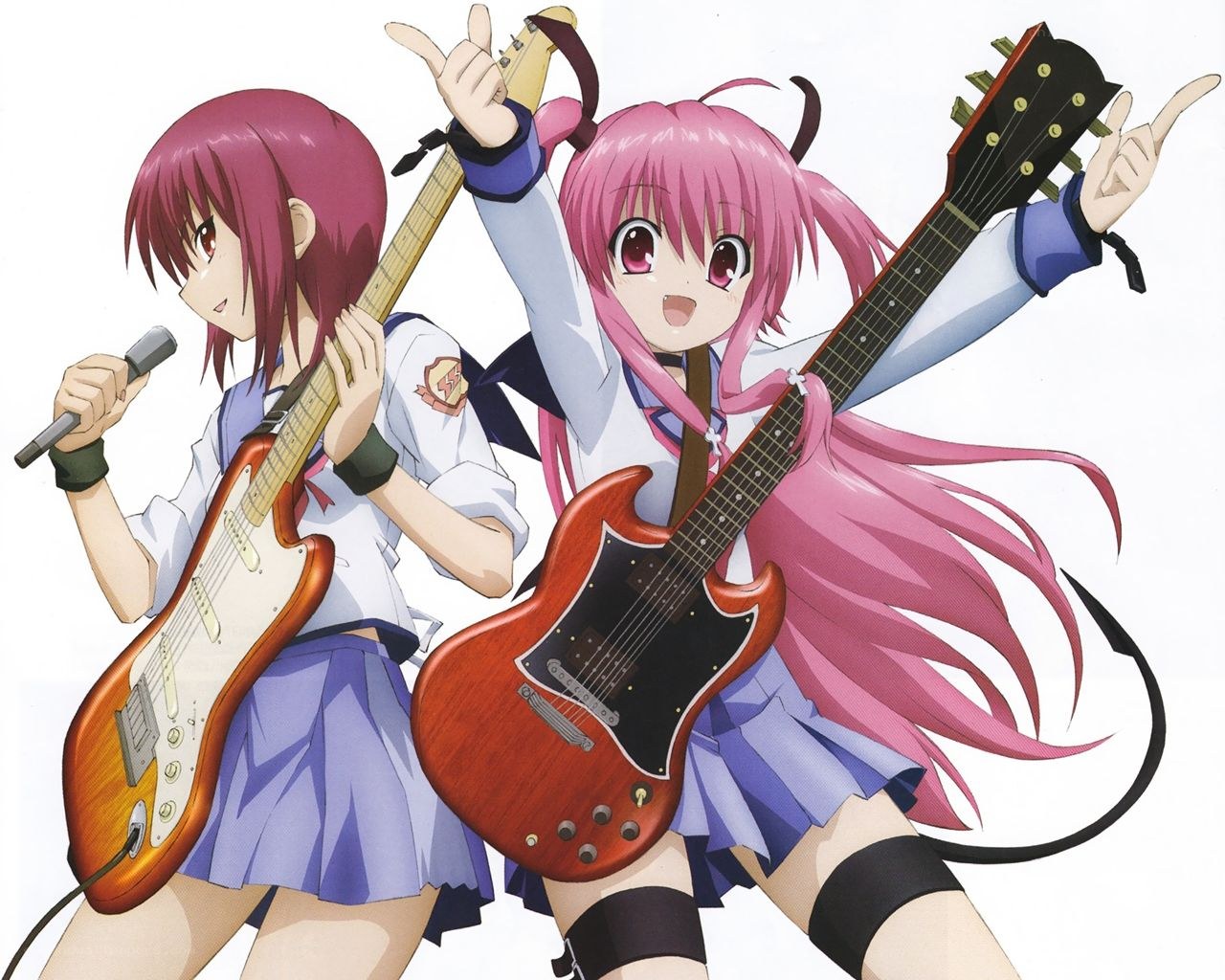 two girls with guitars and microphone