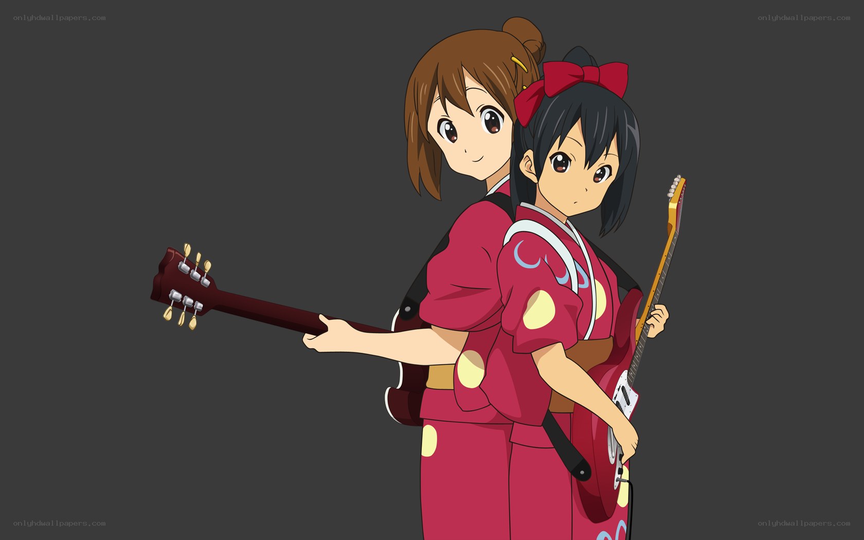 two girls with guitars in kimonos