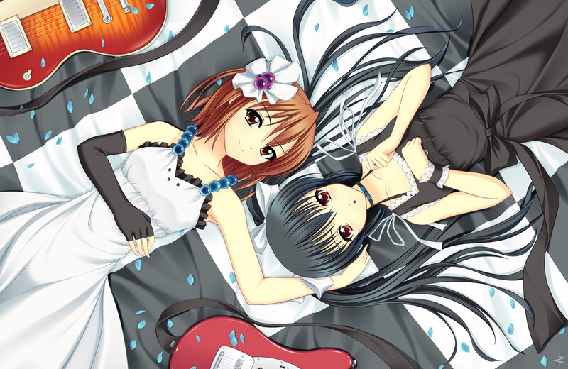 Two girls with guitars