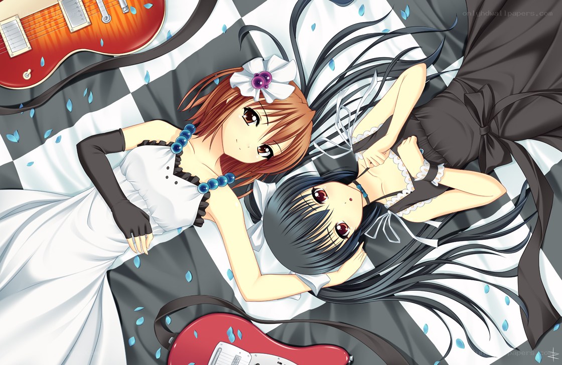 Two girls with guitars
