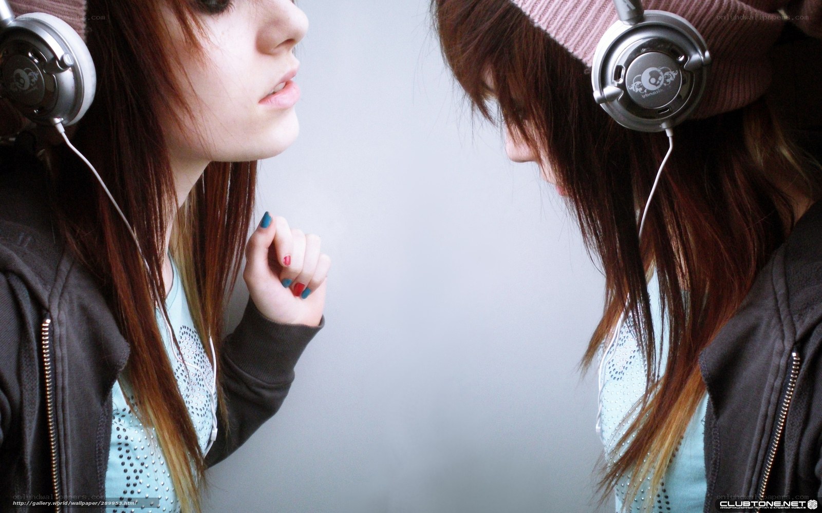 two girls with headphones