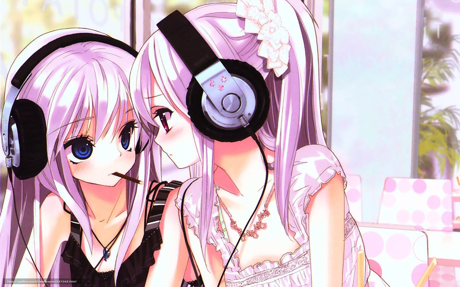 Two girls with headphones