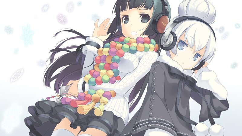 Two girls with headphones in snow