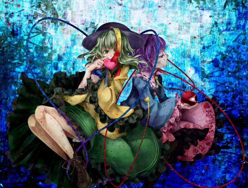 Two girls with heart-shaped objects