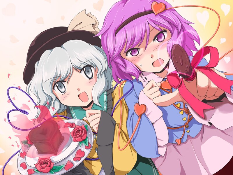 Two girls with heart-shaped treats