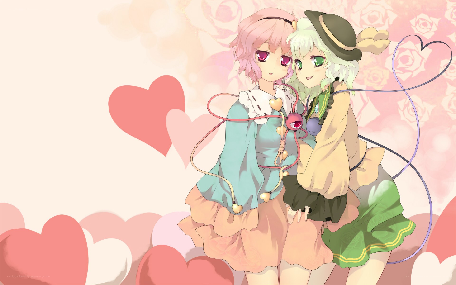 two girls with hearts