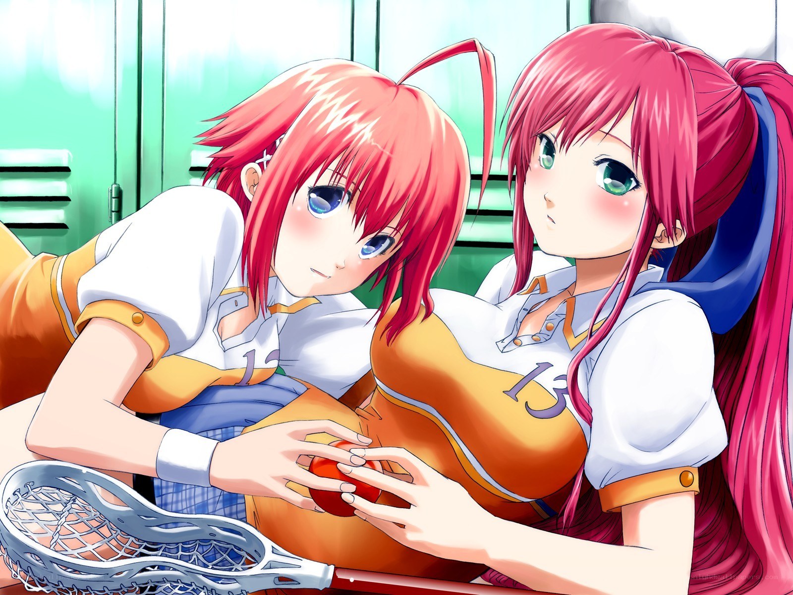 Two girls with lacrosse gear