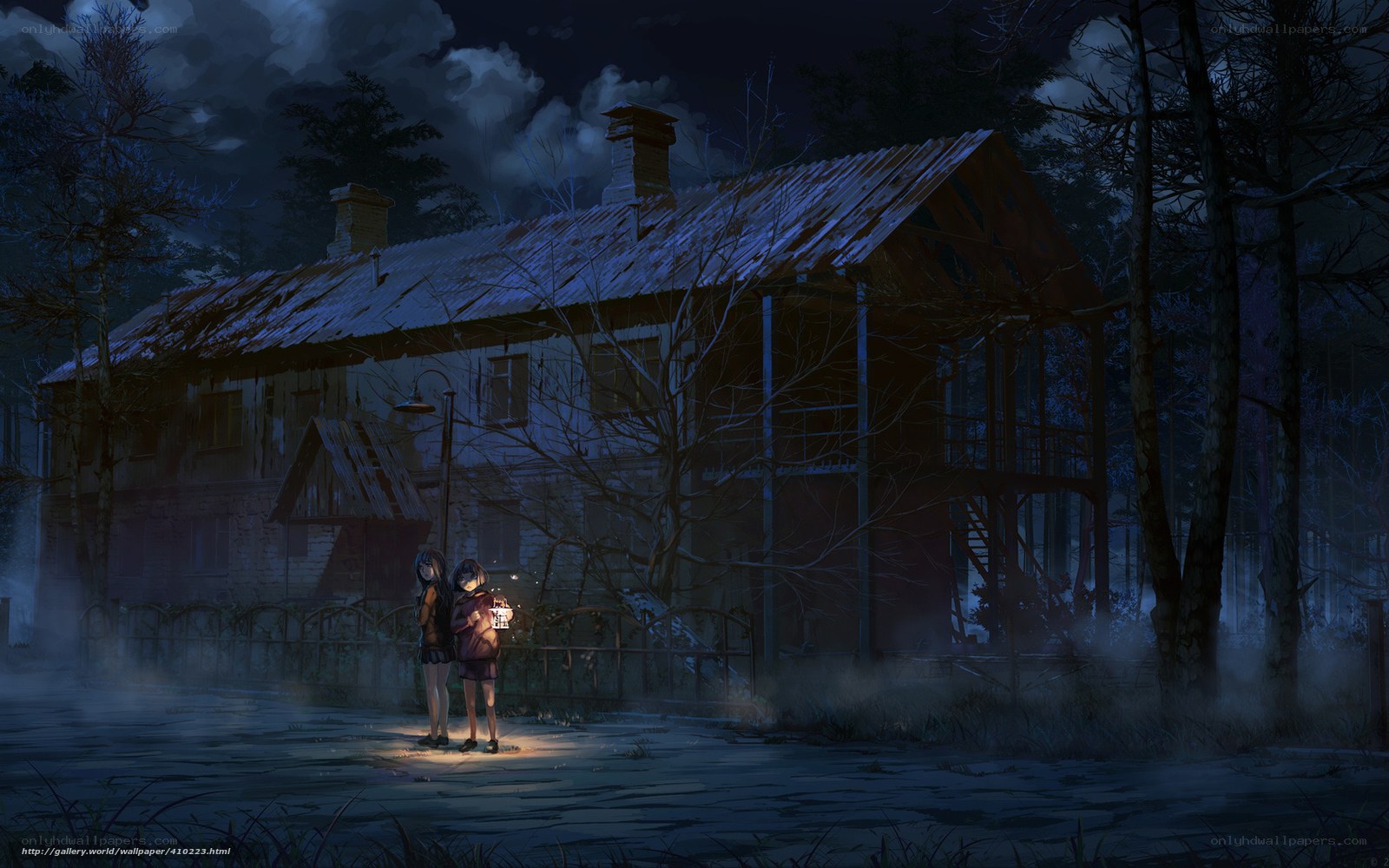 Two girls with lantern at old house