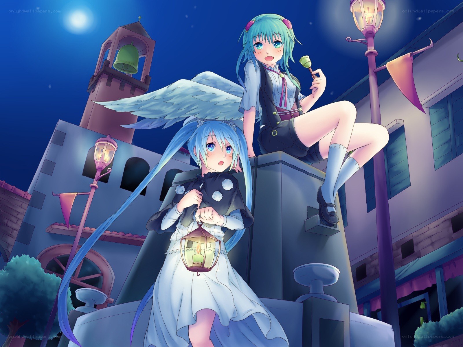 Two girls with lanterns at night