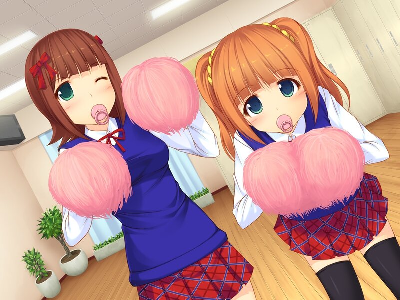 Two girls with pacifiers