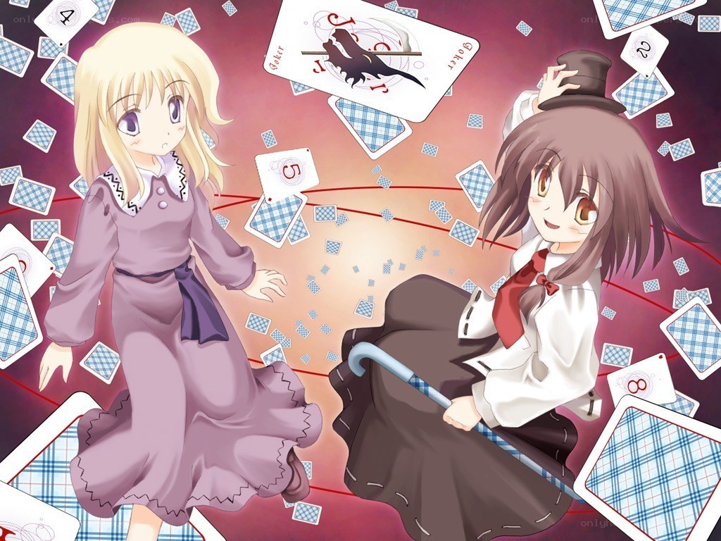 Two girls with playing cards