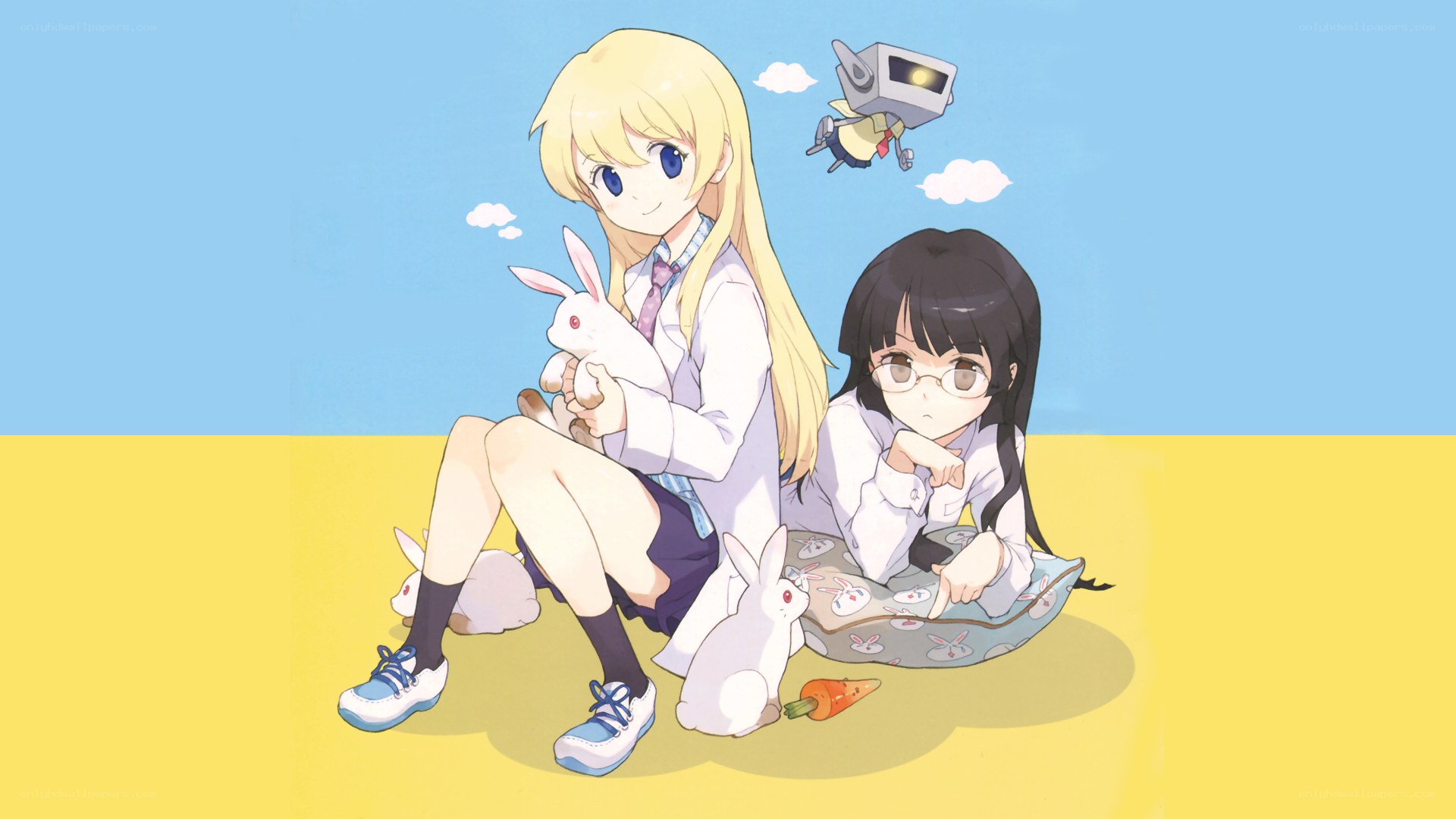 Two girls with rabbits