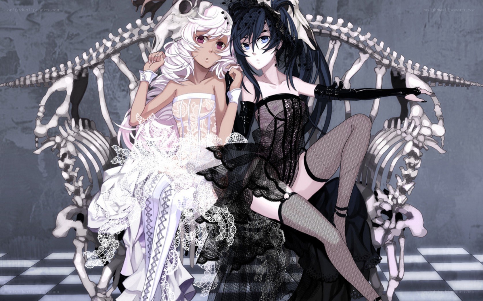 Two girls with skeletons
