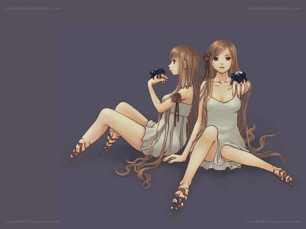 Two girls with spiders