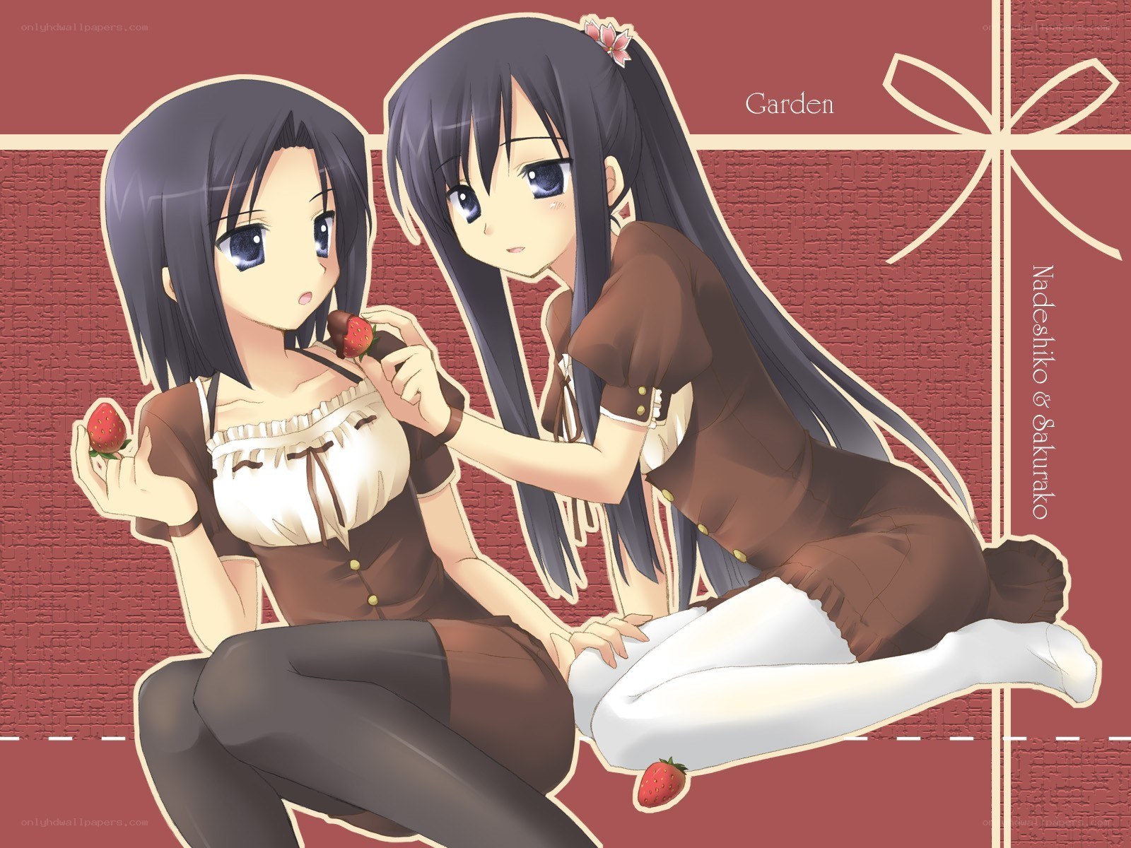 Two girls with strawberries