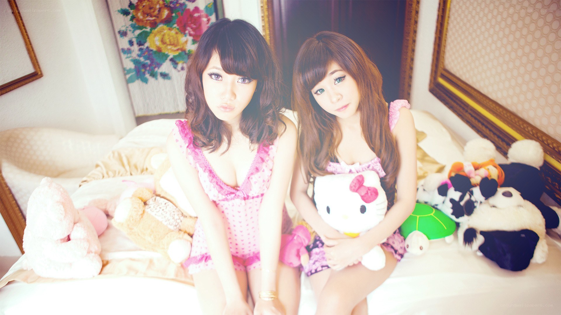 Two girls with stuffed animals