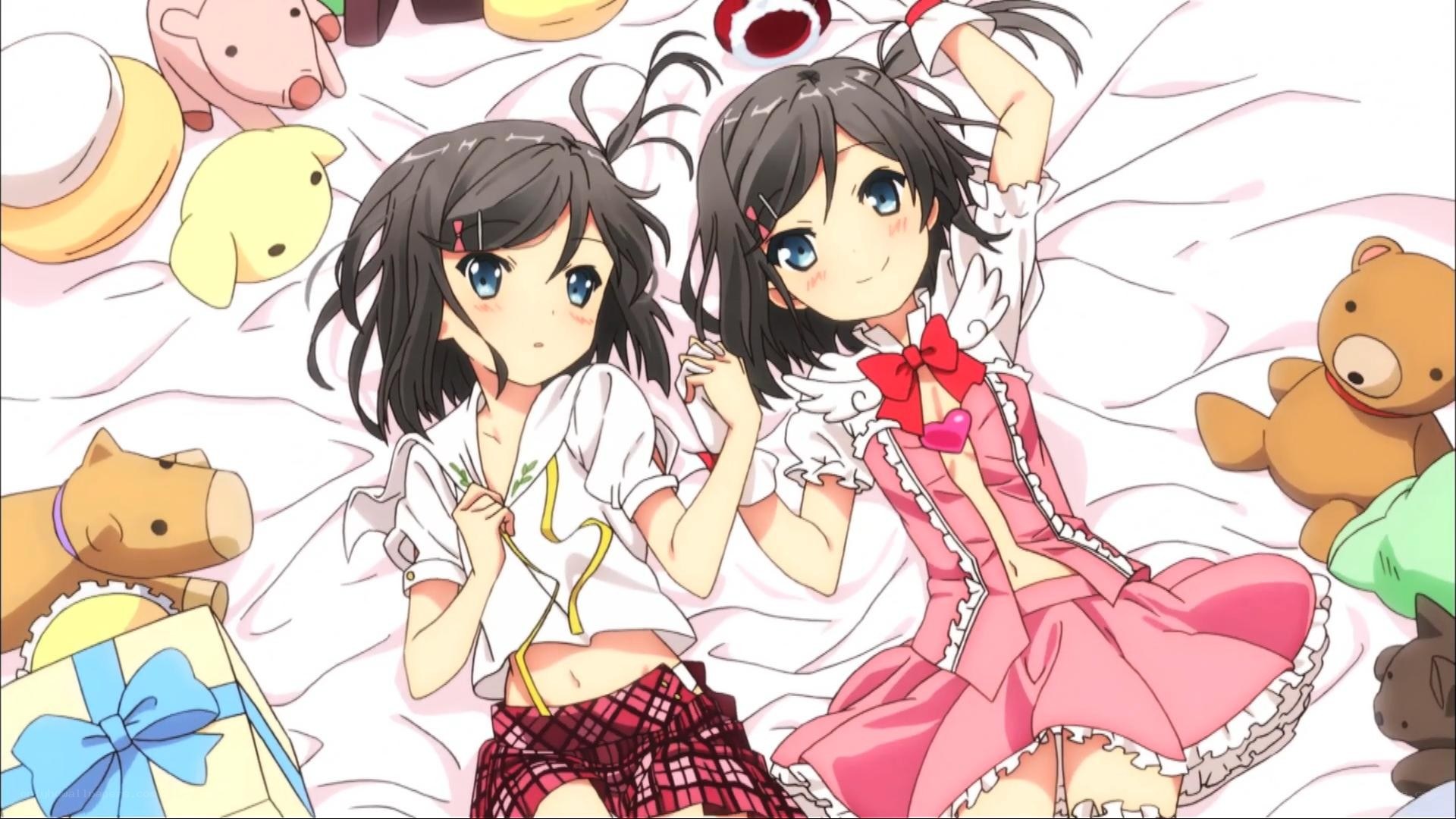Two girls with stuffed animals