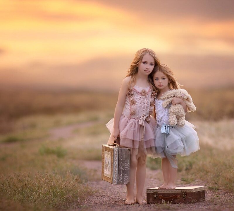 Two Girls with Suitcases