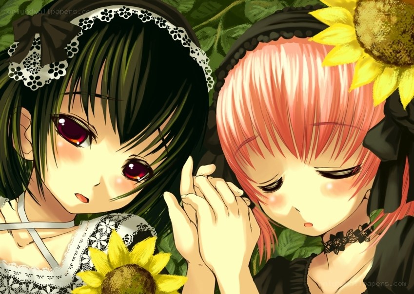 Two girls with sunflowers