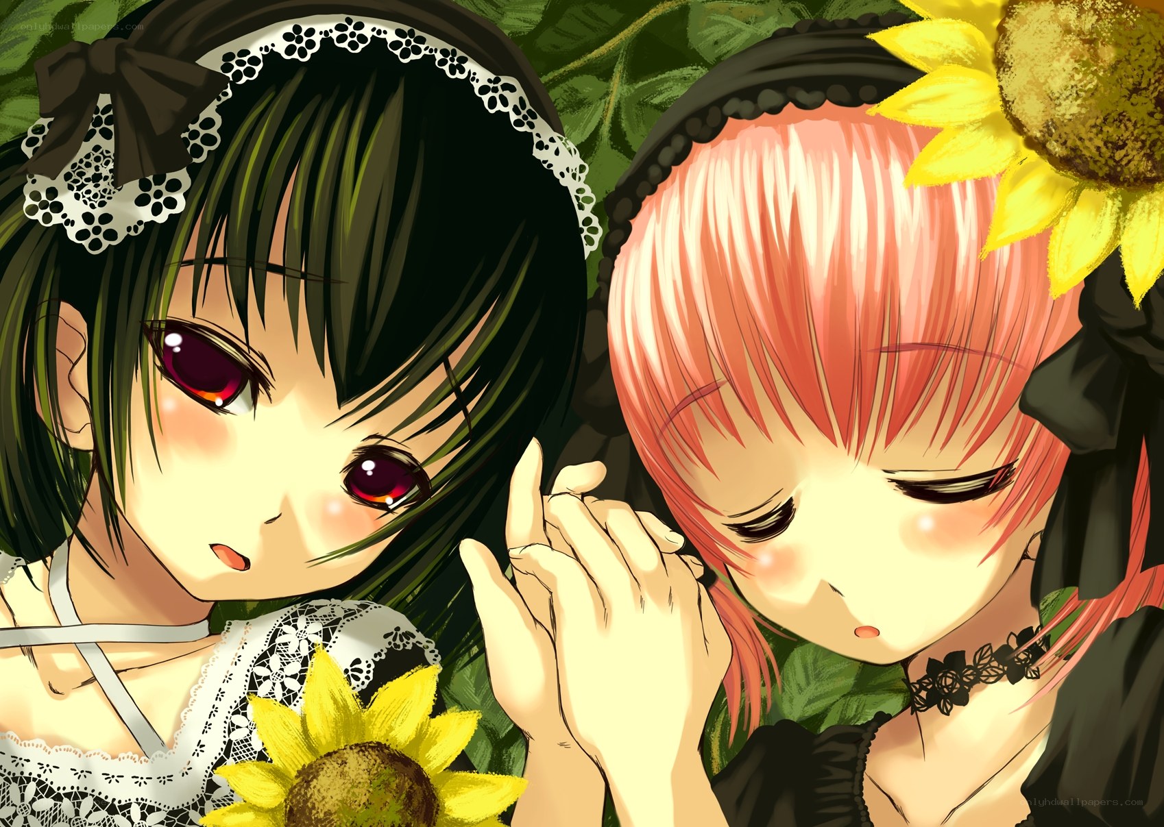 Two girls with sunflowers