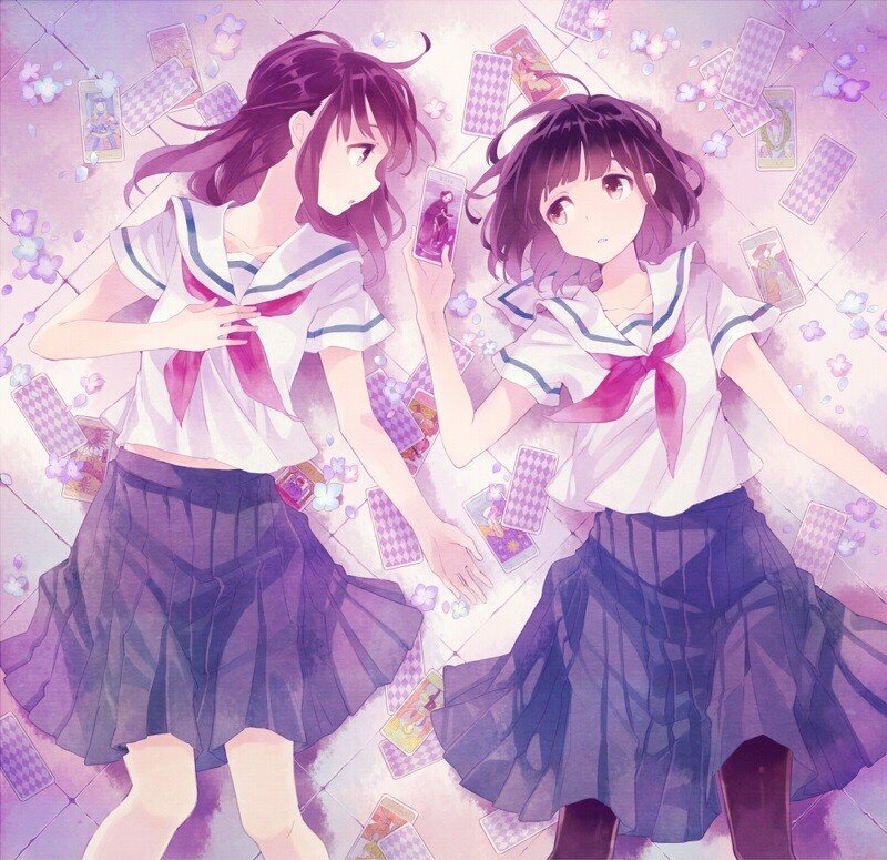 Two girls with tarot cards