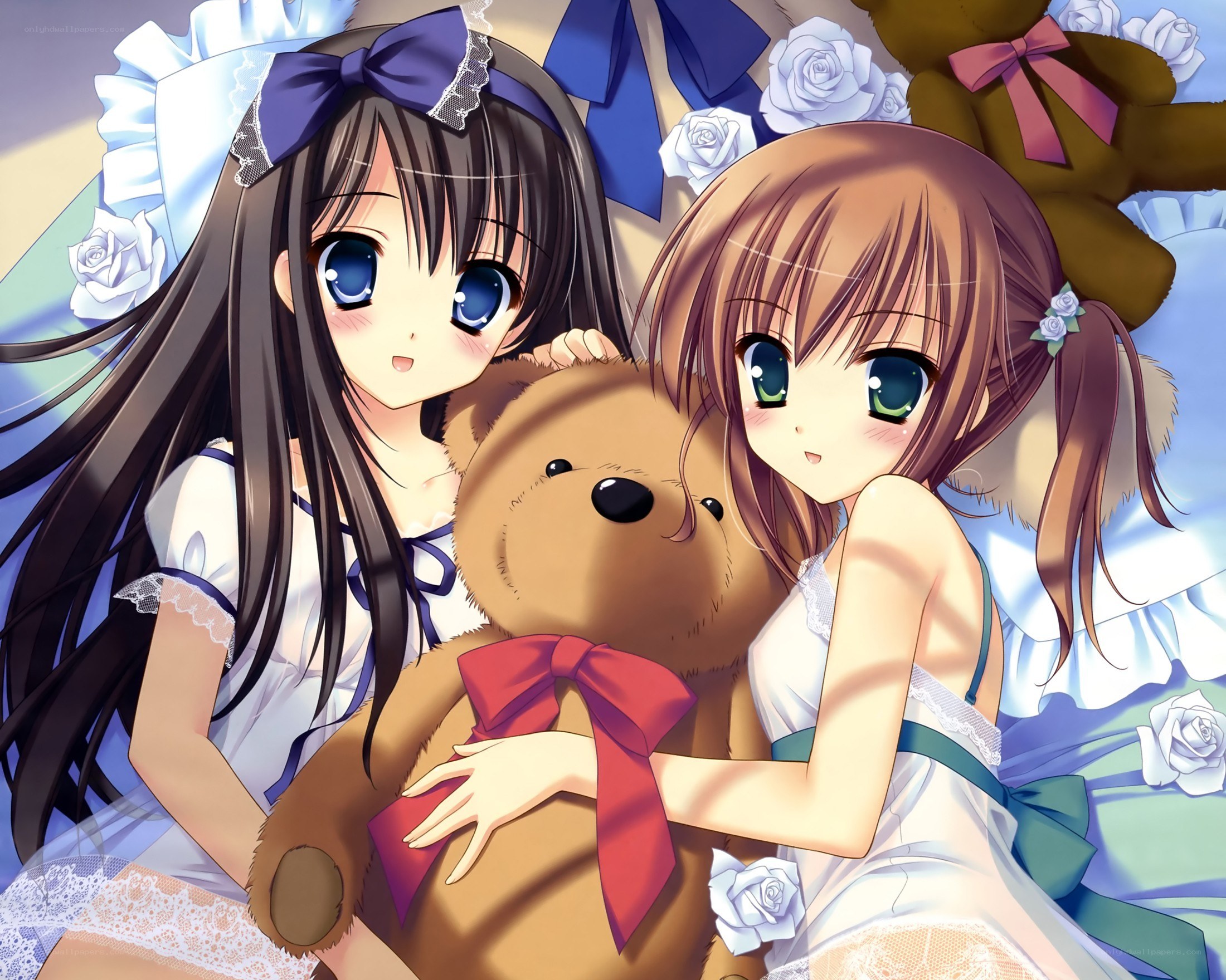 Two girls with teddy bear