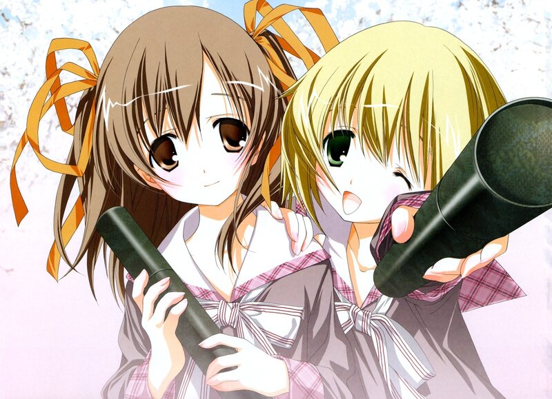 Two girls with toy cannons
