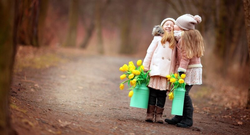 Two Girls with Tulips — Yellow, Playful
